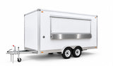 Three-quarter view of a 4m white commercial food trailer with closed serving hatch and checker plate trim on tandem axles