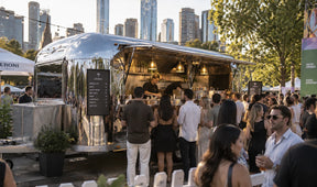airstream trailer at a busy event in melbourne selling cocktails and other drinks