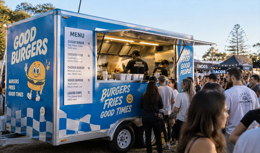 crowds around a 4m food trailer that sells smash burgers at a busy event 