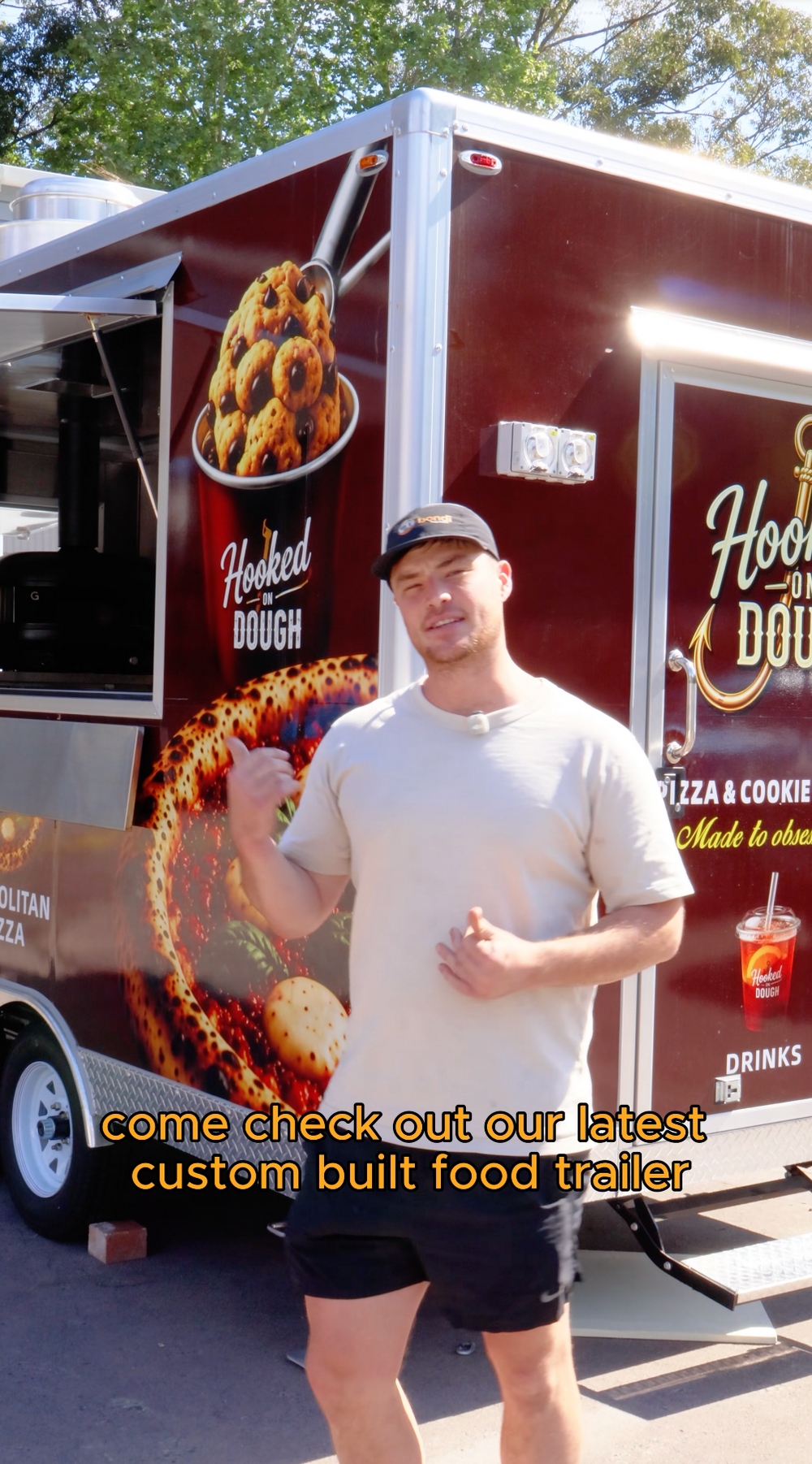 still photo from video walk through of custom pizza food trailer